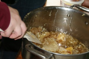 Crush and strain method of honey extraction